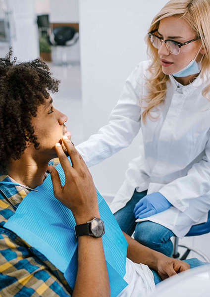 What Should I Do If a Tooth Gets Loose or Knocked Out Image